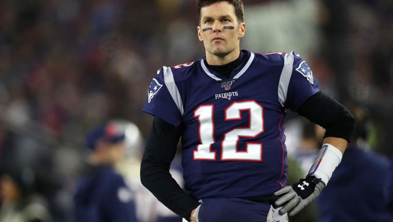 Tom Brady #12 of the New England Patriots looks on during the the AFC Wild Card Playoff game against the Tennessee Titans at Gillette Stadium on January 04, 2020 in Foxborough, Massachusetts. (Photo by Maddie Meyer/Getty Images)