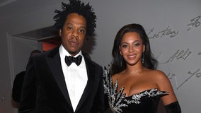 TMZ: Beyoncé and Jay-Z stay seated during Super Bowl national anthem performance