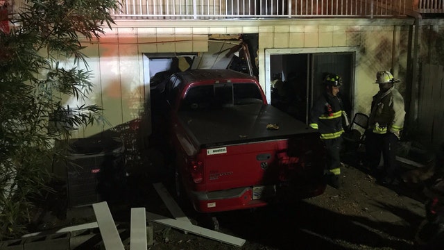 Truck crashes into home, injures 1 near Ruth Eckerd Hall