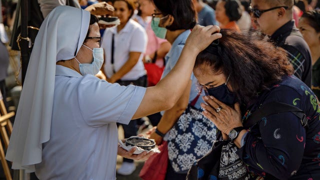 Caution, cancellations mark Ash Wednesday in time of coronavirus