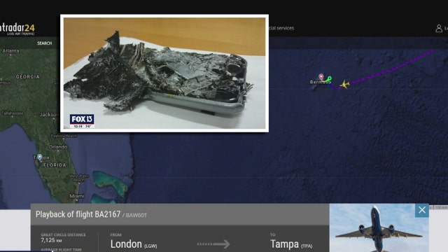 Phone stuck in reclined seat catches fire on flight from London to Tampa