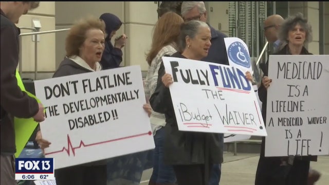 Dozens protest bill to cut funding, resources for disabled