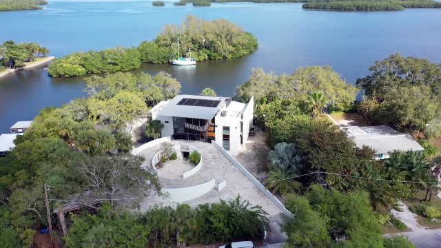 Waterfront hideaway: Unique glass-and-wood Ruskin home to be auctioned