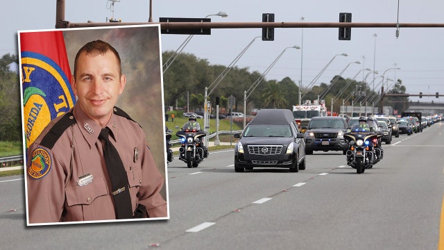Body of slain Florida trooper escorted to Sarasota County