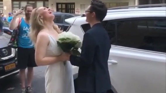 New York couple wed in marriage officiated from friend's window