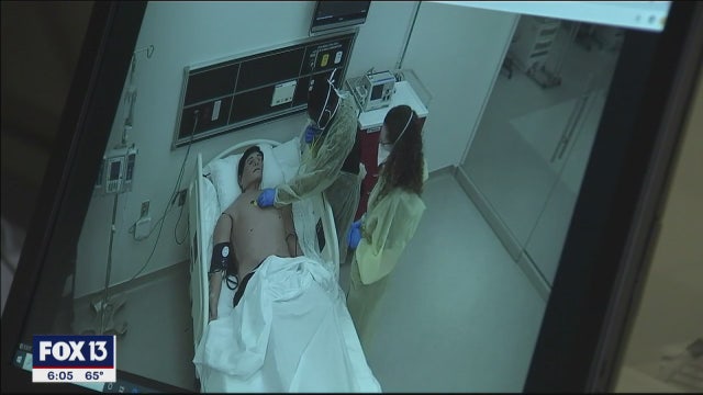 Medical students care for mechanical patient that simulates symptoms of COVID-19