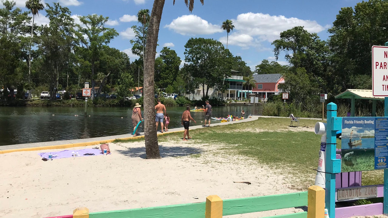 Dozens hit the sand and surf as Hernando County reopens beaches, parks