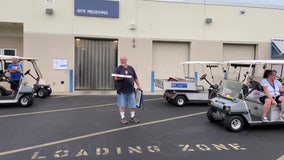 Drive-by retirement ceremony sends St. Petersburg College employee off in style