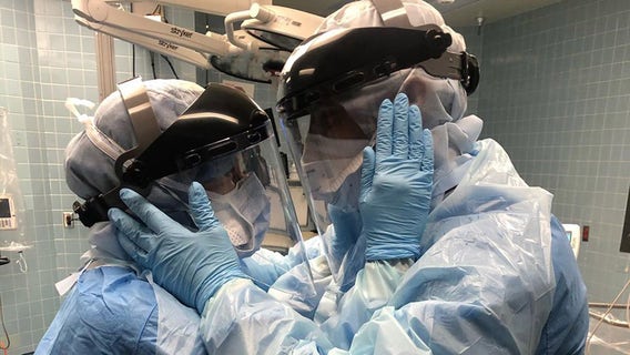 Married nurse couple at Tampa General Hospital fights COVID-19 on the front lines together