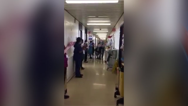 98-year-old WWII veteran beats COVID-19, receives ovation from hospital staff