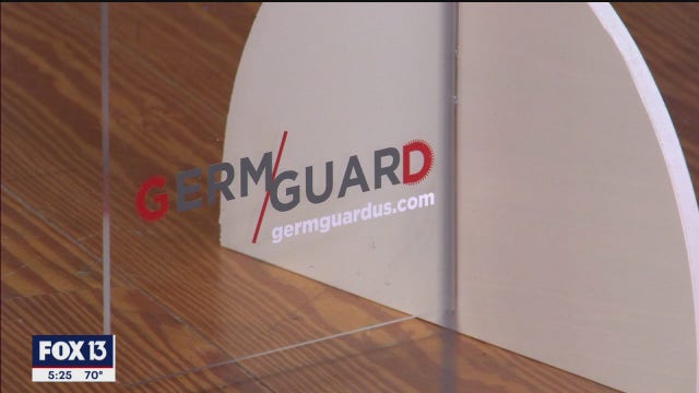 Clearwater sign shop making ready-to-install dividers to keep retail workers, customers safe