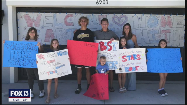 Father of 7 reunites with family after 14 months deployed, 14 days in quarantine