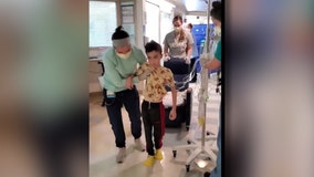8-year-old boy takes first steps after brain tumor surgery