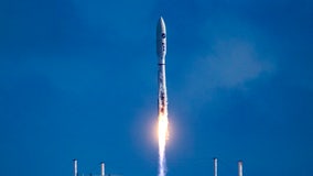 Robotic space plane returns to orbit after hazy Florida launch