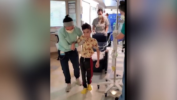 8-year-old boy takes first steps after brain tumor surgery