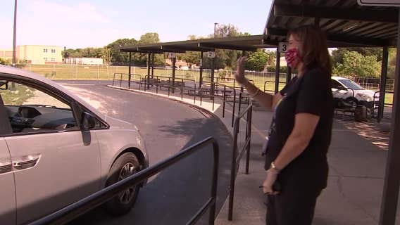 Students pick up belongings after unexpected end to classroom lessons