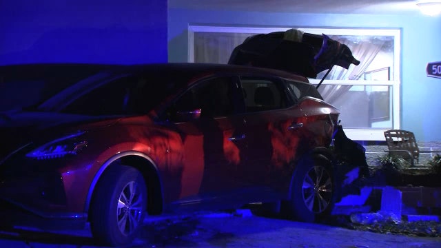 FHP:  20-year-old driver crashes into parked vehicles, home in Pasco County