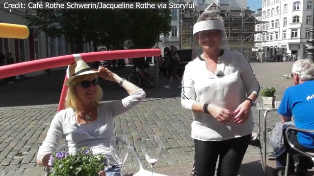 German cafe introduces pool-noodle hats to demonstrate social distancing