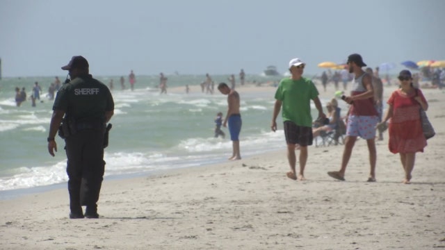 Busy beach weekend after reopening raises concerns for Memorial Day holiday