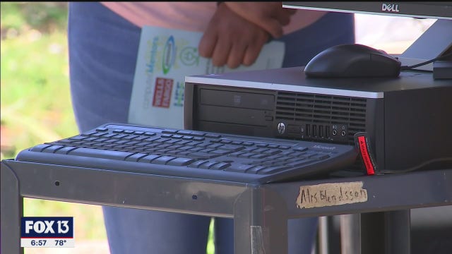 Families with multiple children, 1 computer, get much-needed gift of technology