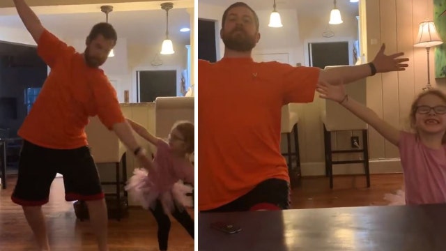 Dad shows off his best ballet moves while dancing with daughter