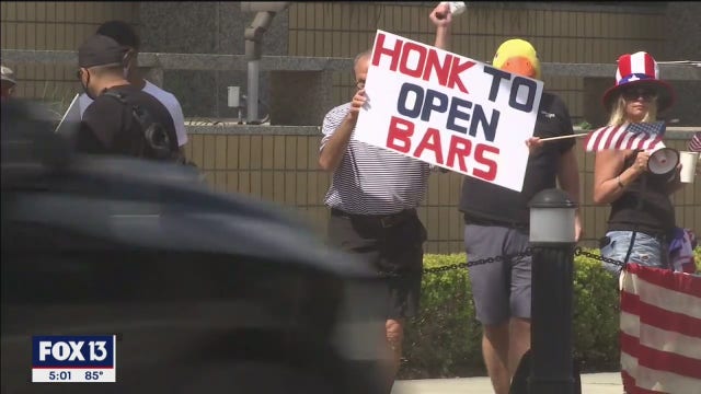 Left out of reopening plan, bar owners hit streets in protest
