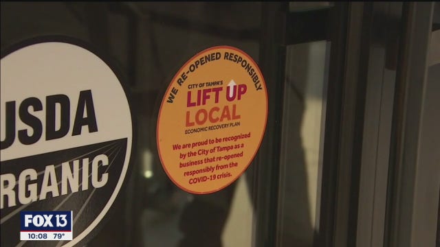 Yellow sticker means Tampa businesses follows COVID-19 safety guidelines