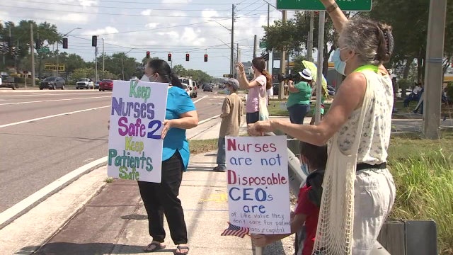 Nurses protest potential layoffs as hospitals cope with costs of pandemic