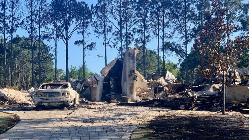 Homes destroyed in Florida Panhandle as wildfires rage on