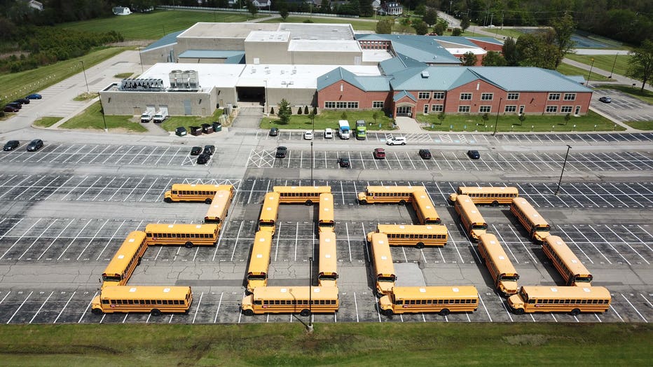 This is for you': School bus drivers form '2020' in touching ...