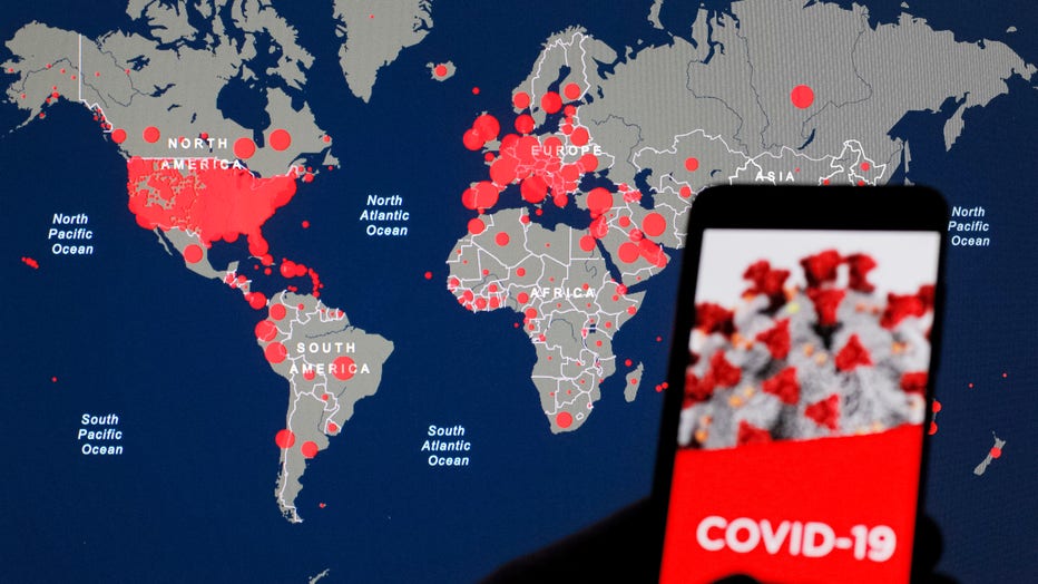 In this photo illustration the Coronavirus COVID-19 Global