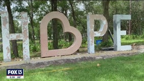 Hopeful messages fill new sculpture at Harvest Hope Park