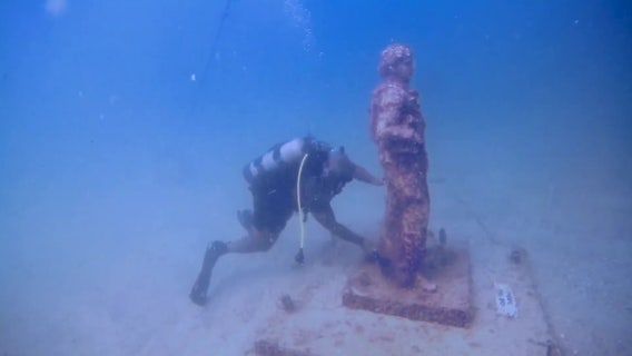 Disabled veterans dive to clean Pinellas County underwater war memorial