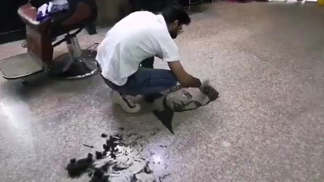 Iraqi barber makes artworks with customers' hair