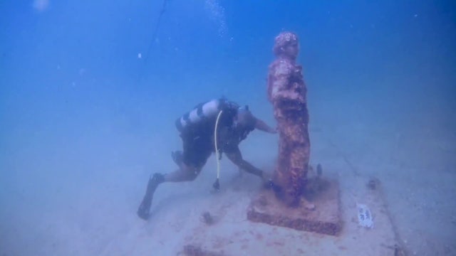 Disabled veterans dive to clean Pinellas County underwater war memorial
