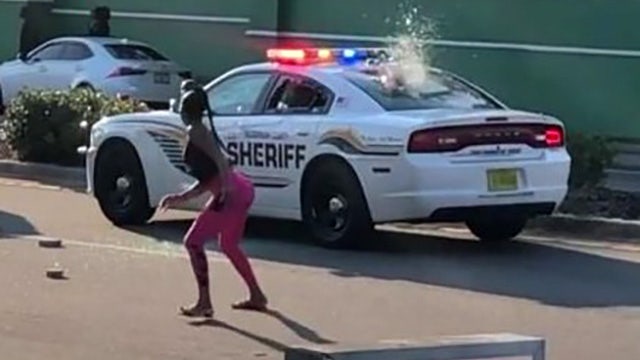 Reward offered for info on suspect who threw brick through cruiser's window