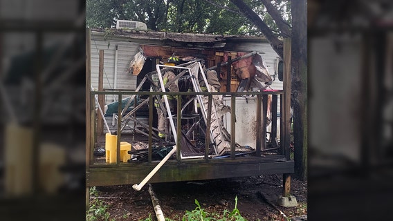 Wheelchair-bound resident pulled from burning travel trailer in Land 'O Lakes