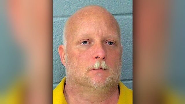 Oklahoma man shoots woman trying to steal Nazi flag from his home, authorities say