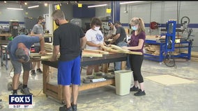 Students build picnic tables for outdoor classes at Wendell Krinn Technical High School