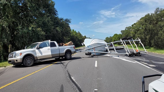 Overturned boat trailer blocks southbound I-75 lanes in Hillsborough