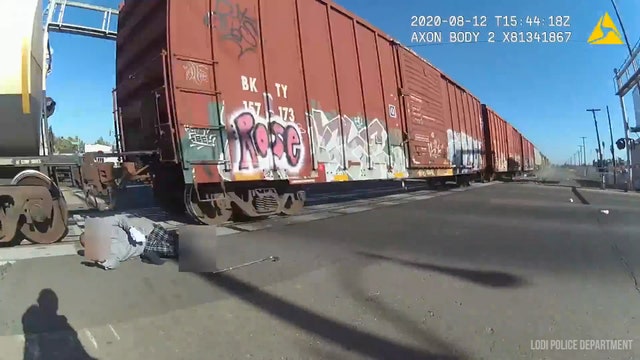 California police officer saves man in wheelchair from oncoming train