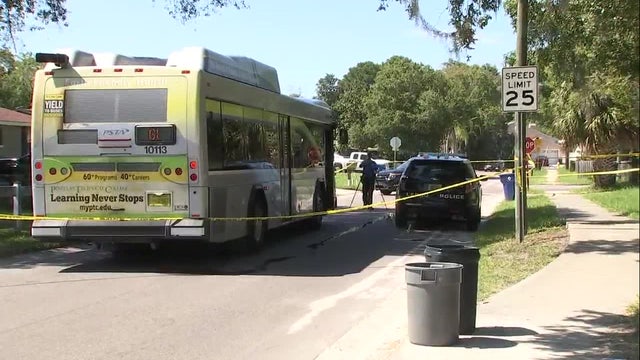 Largo police officer hit by bus while trying to escape aggressive dog