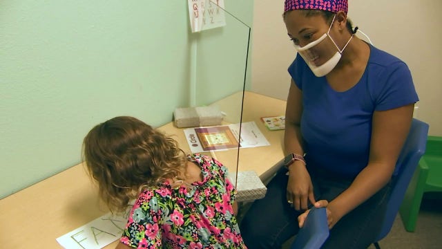 Expert: Transparent masks make clear difference for special-needs kids