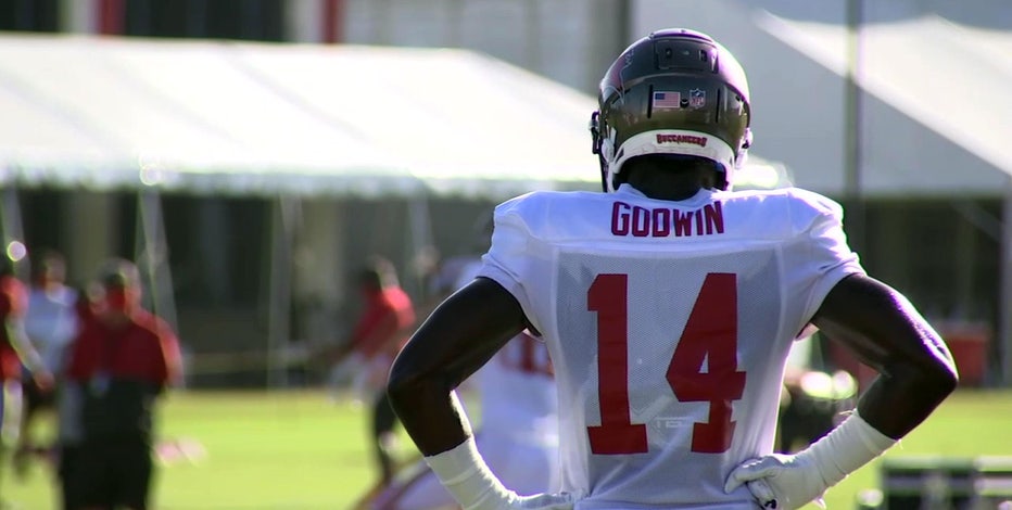 Buccaneers receiver Chris Godwin offers Tom Brady #12 jersey