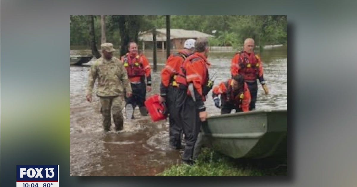 Crew from Tampa Bay helps rescue man, dog from flooded Escambia County ...