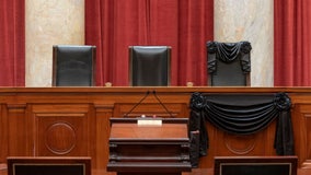 Supreme Court drapes black cloth over Justice Ruth Bader Ginsburg's seat, photos show