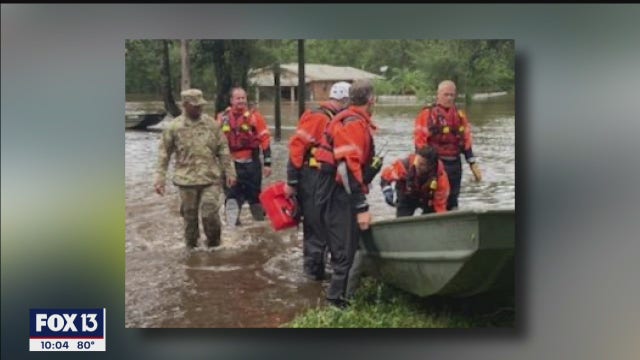 Crew from Tampa Bay helps rescue man, dog from flooded Escambia County home