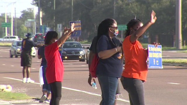 Tampa VA employees join hundreds across the country protesting for hazard pay, more PPE