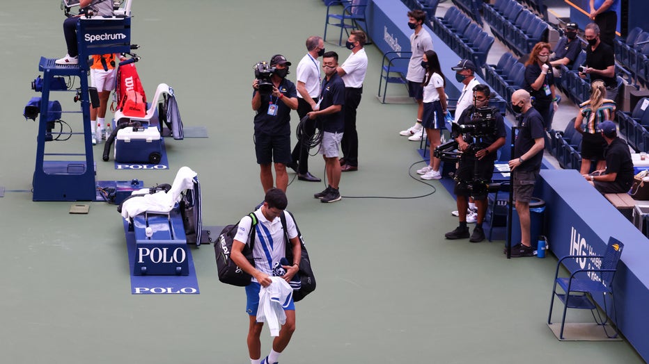 Djokovic out of US Open after hitting line judge with ball