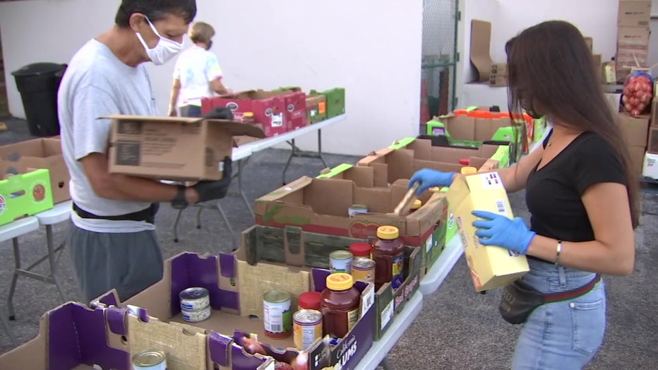 Meals on Wheels for kids volunteers loading boxes